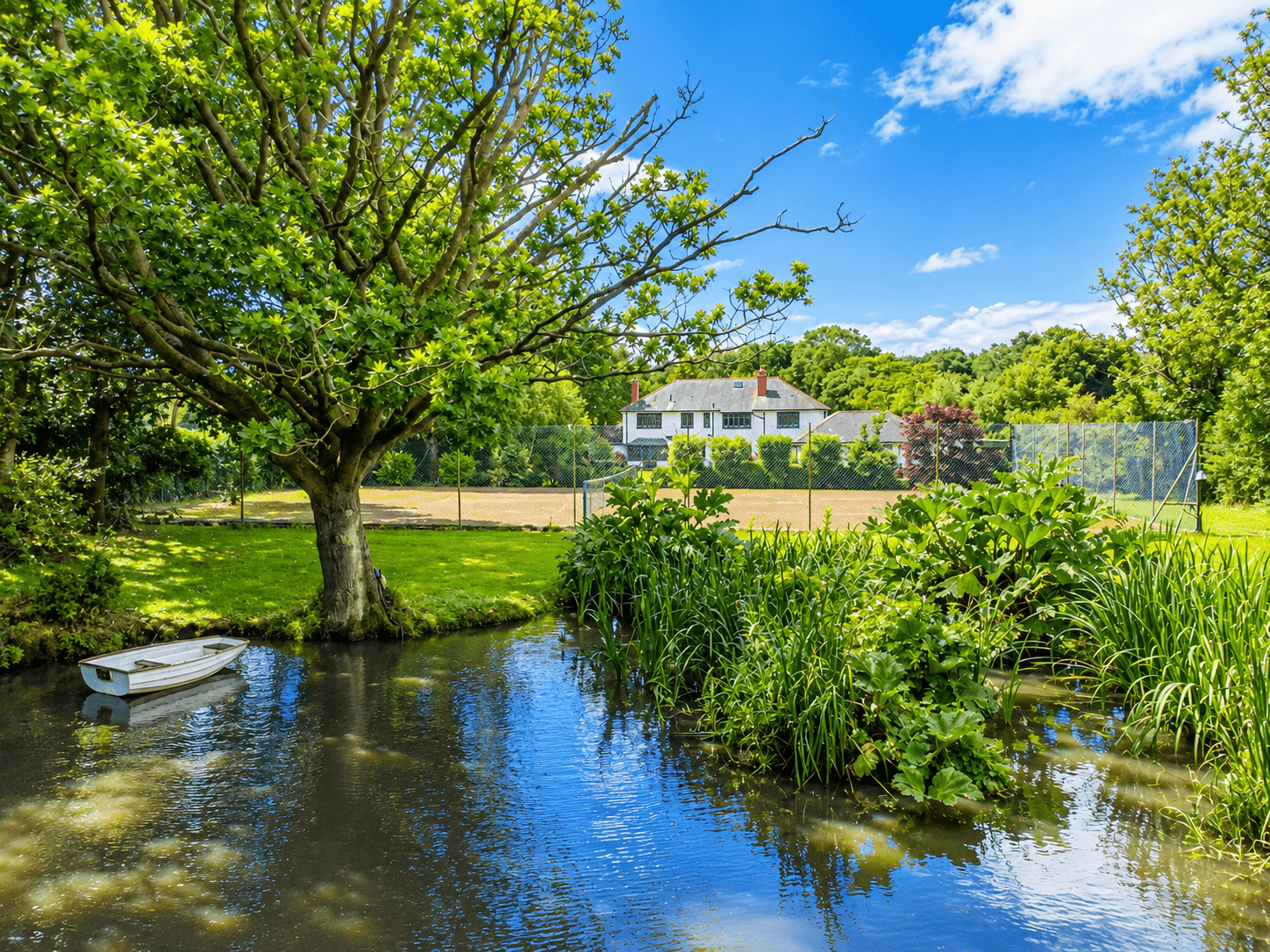 £1.7m Wirral Home with Lake & Tennis Court for Sale
